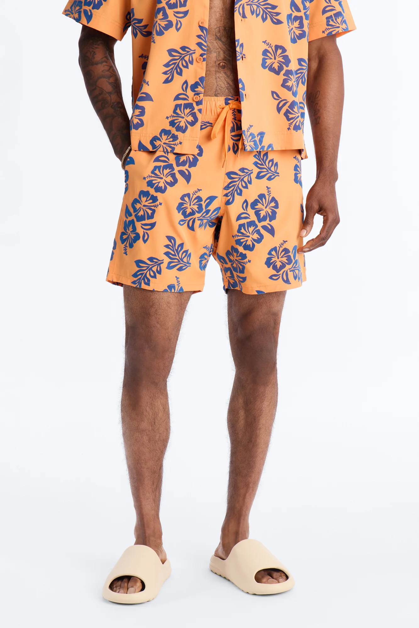 Flocked Hibiscus Heat Swim Trunk 7″ - Orange