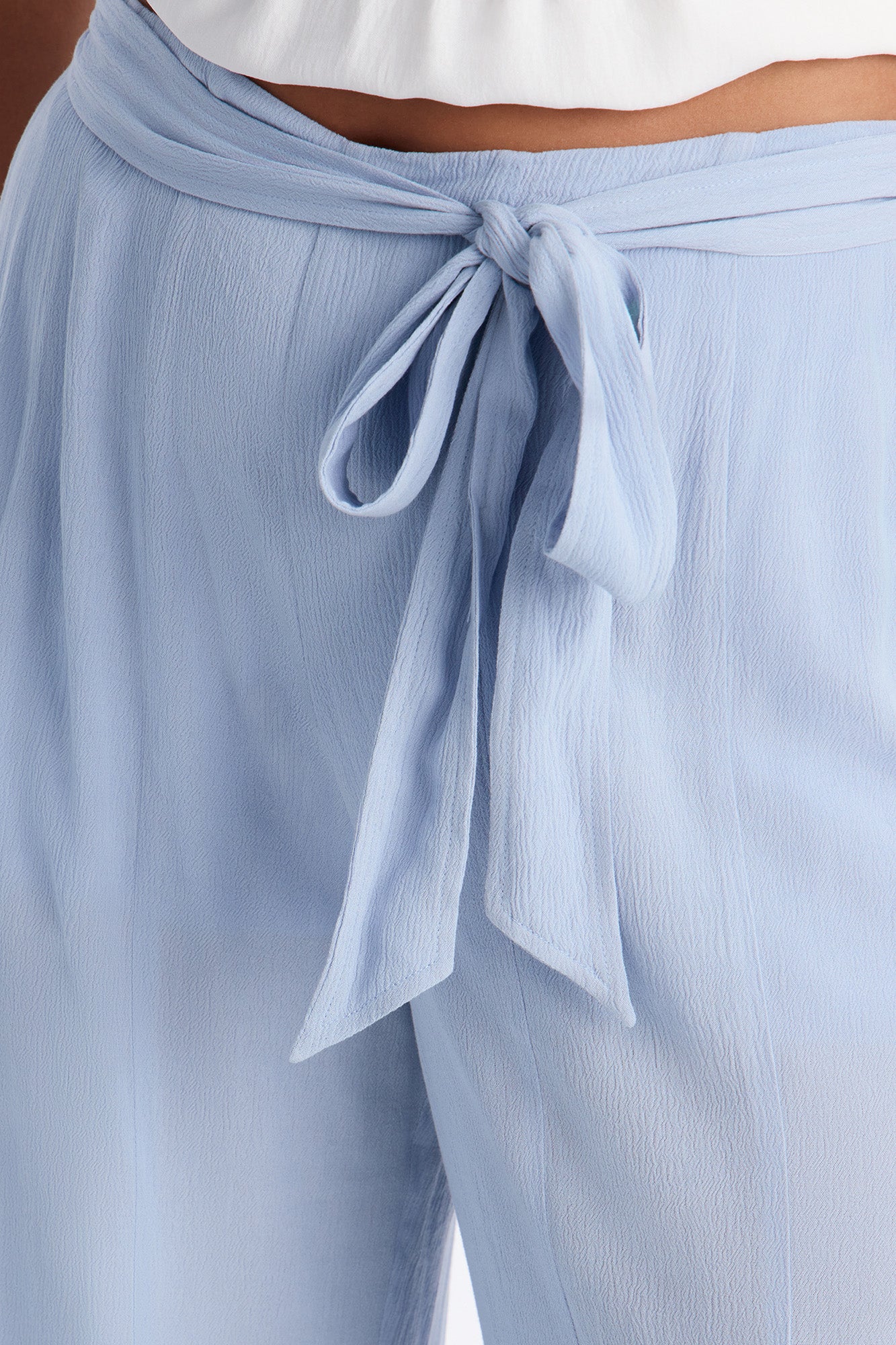 Kelsey Mid Rise Tie Waist Flowy Wide Leg Pant 34″ - Light Blue - Image 6