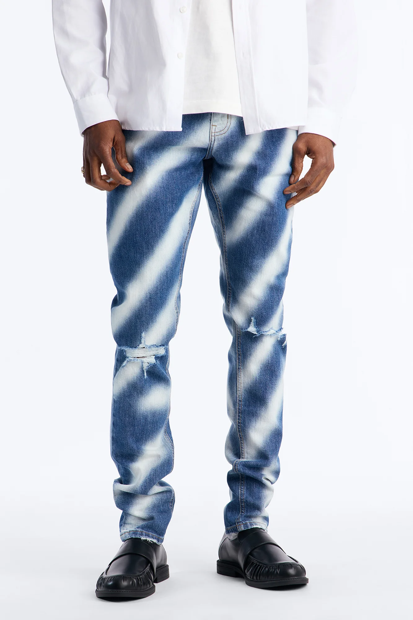 Stacked Skinny Vortex Distressed Jean - Medium Blue Wash